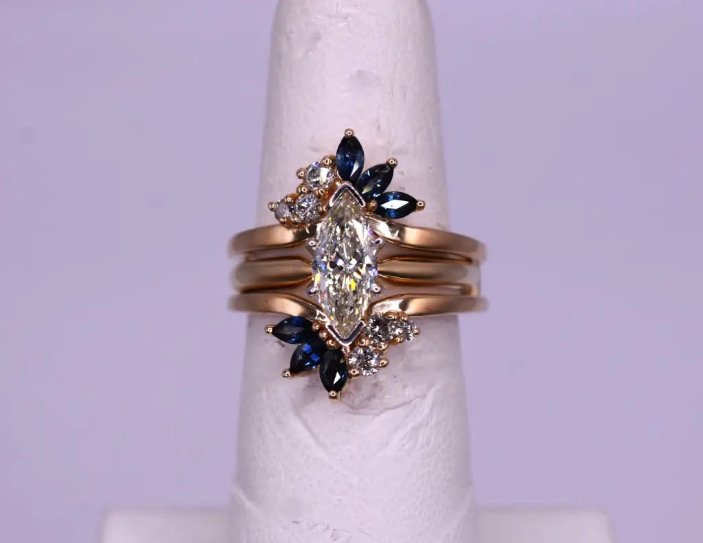 Solitaire Marquise Diamond Engagement Ring with Diamond and Sapphire Wrap-Around